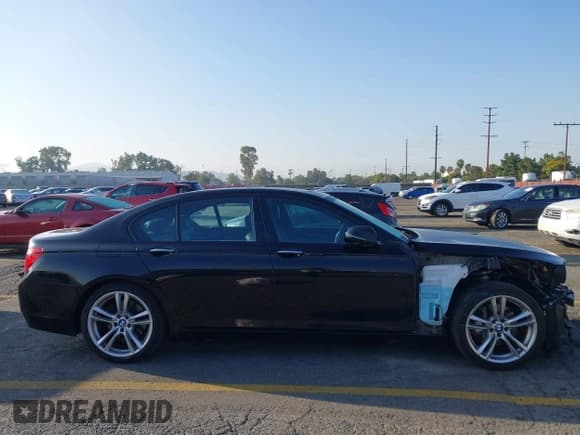 ✅ 2014 BMW 7 Series 740i • VIN: WBAYA6C57ED144071 • Лот: 43340955. Опубликован ранее на IAAI с пробегом 84 339 миль. Бесплатный доступ к архиву аукционных продаж из США и подробный отчёт об истории автомобиля на DreamBid. Изображение 14.