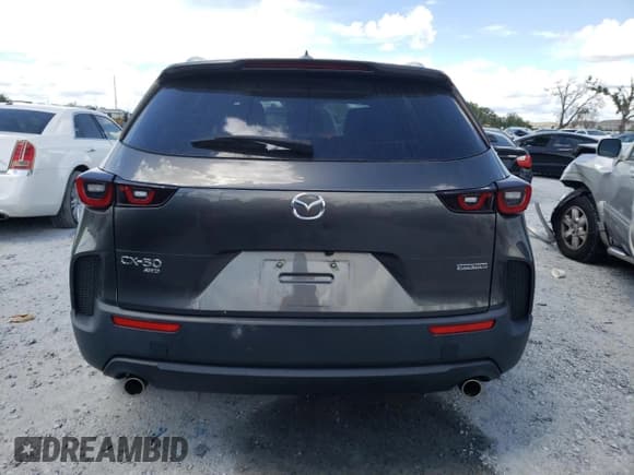 ✅ 2023 Mazda CX-50 S Premium Plus • VIN: 7MMVABEM8PN136223 • Lot: 71307085. Listed on Copart with 22,401 mi. Free auction sales archive from the USA and detailed vehicle history report at DreamBid. Image 6.