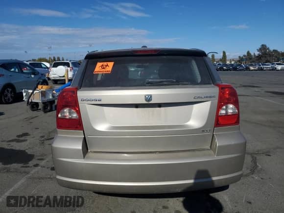2010 Dodge Caliber SXT с VIN 1B3CB4HA5AD618955, выставлен на аукционе Copart как лот 81330035 с пробегом Не указан миль и Списание • Salvage title. История ставок и продаж доступна на DreamBid. Изображение 6.