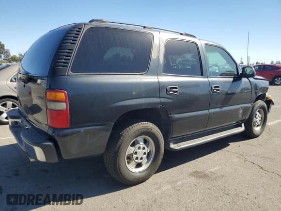 ✅ 2003 Chevrolet Tahoe LS • VIN: 1GNEC13V53R233325 • Lot: 82772675. Listed on Copart with 181,599 mi. Free auction sales archive from the USA and detailed vehicle history report at DreamBid. Image 3.