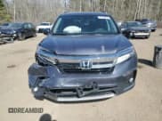 ✅ 2022 Honda Pilot Touring 7-Passenger • VIN: 5FNYF6H61NB504935 • Lot: 51186805. Listed on Copart with 99,373 mi. Free auction sales archive from the USA and detailed vehicle history report at DreamBid. Image 5.