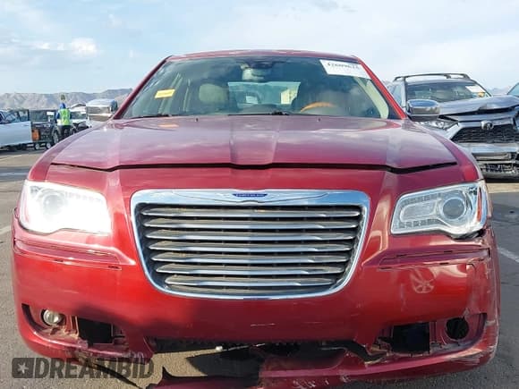✅ 2012 Chrysler 300 C • VIN: 2C3CCAET0CH195292 • Lot: 42609625. Listed on IAAI with 63,859 mi. Free auction sales archive from the USA and detailed vehicle history report at DreamBid. Image 12.