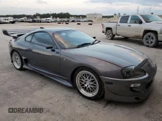 ✅ 1996 Toyota Supra • VIN: JZA800034162 • Лот: 80046394. Опубликован ранее на Copart с пробегом 86 285 миль. Бесплатный доступ к архиву аукционных продаж из США и подробный отчёт об истории автомобиля на DreamBid. Изображение 4.