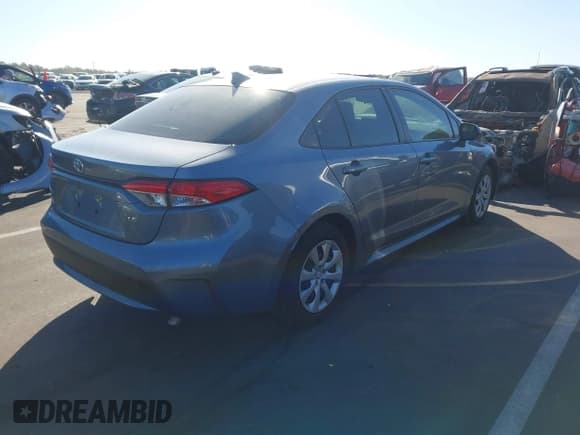 ✅ 2021 Toyota Corolla LE • VIN: JTDEPMAE5MJ124980 • Lot: 43506447. Listed on IAAI with 65,485 mi. Free auction sales archive from the USA and detailed vehicle history report at DreamBid. Image 4.