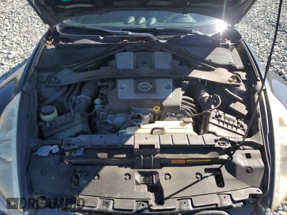 ✅ 2009 Nissan 370Z Touring • VIN: JN1AZ44E69M406347 • Лот: 85711325. Опубликован ранее на Copart с пробегом 123 827 миль. Бесплатный доступ к архиву аукционных продаж из США и подробный отчёт об истории автомобиля на DreamBid. Изображение 11.