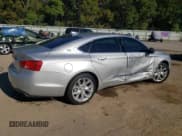 ✅ 2019 Chevrolet Impala Premier • VIN: 2G1105S3XK9109706 • Лот: 77207044. Опубликован ранее на Copart с пробегом 99 123 миль. Бесплатный доступ к архиву аукционных продаж из США и подробный отчёт об истории автомобиля на DreamBid. Изображение 3.