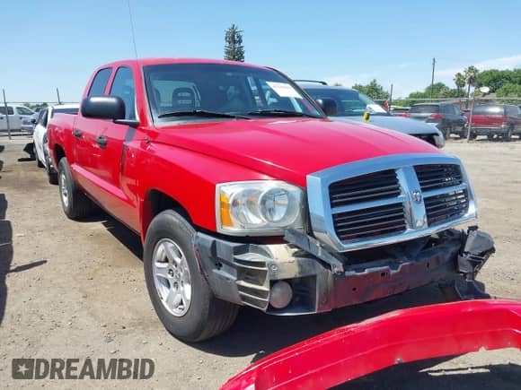 2006 Dodge Dakota SLT with VIN 1D7HE48NX6S588584, listed as a IAAI auction lot 42348429 with 246,965 mi miles and . Bid and sale history available at DreamBid. Image 1.