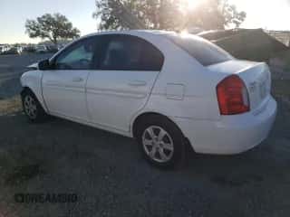 2010 Hyundai Accent GLS z VIN KMHCN4AC6AU486527, wystawiony jako Copart lot #83183114 z przebiegiem 85 420 mil mil oraz Szkoda całkowita • Salvage title. Historia ofert i sprzedaży dostępna na DreamBid. Obrazek 2.