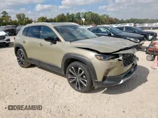 ✅ 2025 Mazda CX-50 Premium • VIN: 7MMVABDY7SN353095 • Лот: 91917125. Опубликован ранее на Copart с пробегом 1 524 миль. Бесплатный доступ к архиву аукционных продаж из США и подробный отчёт об истории автомобиля на DreamBid. Изображение 4.