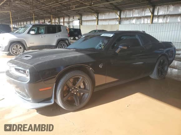 2021 Dodge Challenger SRT Hellcat с VIN 2C3CDZC9XMH601650, выставлен на аукционе Copart как лот 70405545 с пробегом 33 571 миль миль и Списание • Salvage title. История ставок и продаж доступна на DreamBid. Изображение 1.