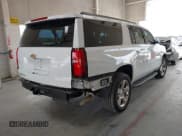 ✅ 2020 Chevrolet Suburban LT • VIN: 1GNSCHKC3LR181222 • Lot: 43047813. Wystawiony na IAAI z przebiegiem 103 318 mil. Bezpłatny archiwum sprzedaży aukcyjnych z USA i szczegółowy raport historii pojazdu na DreamBid. Zdjęcie 4.