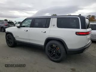 ✅ 2023 Rivian R1S Adventure • VIN: 7PDSGABA4PN009757 • Lot: 80348024. Wystawiony na Copart z przebiegiem 9 851 mil. Bezpłatny archiwum sprzedaży aukcyjnych z USA i szczegółowy raport historii pojazdu na DreamBid. Zdjęcie 2.