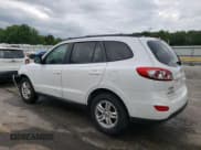 ✅ 2012 Hyundai Santa Fe GLS • VIN: 5XYZGDAB6CG151630 • Lot: 67291054. Listed on Copart with 209,961 mi. Free auction sales archive from the USA and detailed vehicle history report at DreamBid. Image 2.
