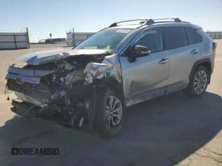 ✅ 2023 Toyota RAV4 Limited • VIN: 2T3N1RFV6PW388450 • Lot: 82204405. Listed on Copart with 27,666 mi. Free auction sales archive from the USA and detailed vehicle history report at DreamBid. Image 1.