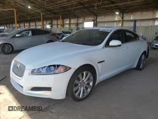 ✅ 2014 Jaguar XF SC • VIN: SAJWJ0EF4E8U30323 • Lot: 49080334. Listed on Copart with 69,546 mi. Free auction sales archive from the USA and detailed vehicle history report at DreamBid. Image 1.