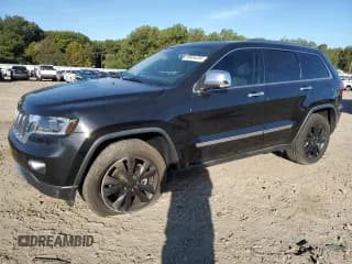 ✅ 2013 Jeep Grand Cherokee Limited • VIN: 1C4RJEBG1DC546497 • Lot: 89654295. Listed on Copart with 241,737 mi. Free auction sales archive from the USA and detailed vehicle history report at DreamBid. Image 1.