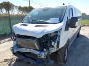 ✅ 2023 Ford Transit Passenger XLT • VIN: 1FBAX2Y88PKA93648 • Lot: 43637916. Listed on IAAI with 42,318 mi. Free auction sales archive from the USA and detailed vehicle history report at DreamBid. Image 6.