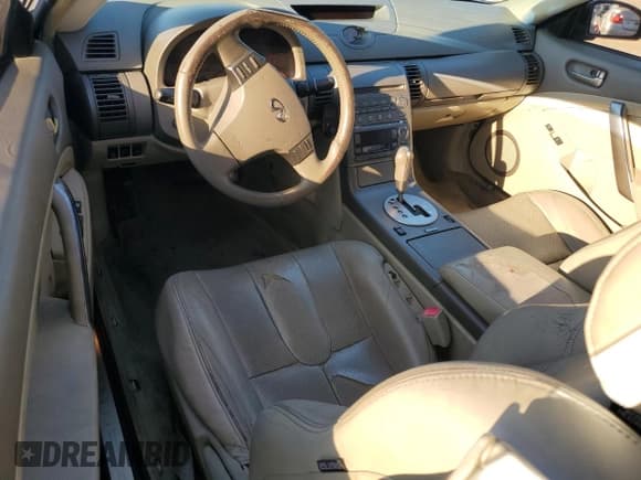 ✅ 2004 Infiniti G35 w/Leather • VIN: JNKCV54E44M812593 • Лот: 81621375. Опубликован ранее на Copart с пробегом 186 588 миль. Бесплатный доступ к архиву аукционных продаж из США и подробный отчёт об истории автомобиля на DreamBid. Изображение 8.