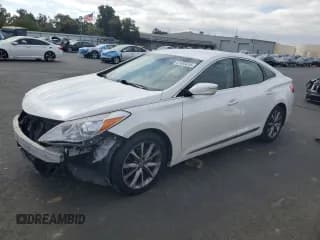 ✅ 2015 Hyundai Azera • VIN: KMHFG4JGXFA440718 • Лот: 87485615. Опубликован ранее на Copart с пробегом 113 556 миль. Бесплатный доступ к архиву аукционных продаж из США и подробный отчёт об истории автомобиля на DreamBid. Изображение 1.