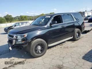2015 Chevrolet Tahoe Commercial с VIN 1GNLC2EC9FR255678, выставлен на аукционе Copart как лот 80341485 с пробегом 128 393 миль миль и Списание • Salvage title. История ставок и продаж доступна на DreamBid. Изображение 1.