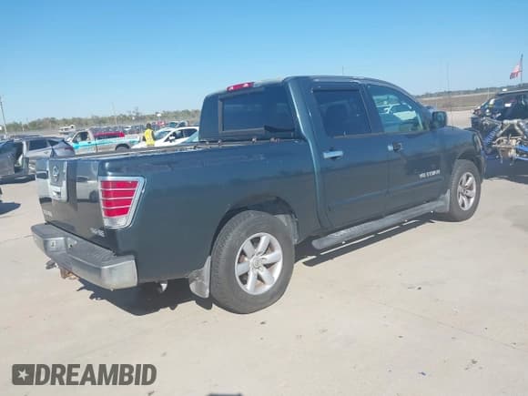 ✅ 2005 Nissan Titan XE • VIN: 1N6BA07AX5N563374 • Lot: 43627413. Listed on IAAI with 151,817 mi. Free auction sales archive from the USA and detailed vehicle history report at DreamBid. Image 4.