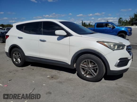 ✅ 2018 Hyundai Santa Fe 2.4L • VIN: 5NMZT3LBXJH078932 • Lot: 89566205. Listed on Copart with 104,864 mi. Free auction sales archive from the USA and detailed vehicle history report at DreamBid. Image 4.