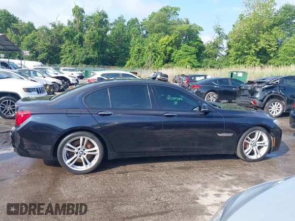 ✅ 2015 BMW 7 Series 750i • VIN: WBAYA8C52FG197627 • Lot: 42369384. Listed on IAAI with 111,358 mi. Free auction sales archive from the USA and detailed vehicle history report at DreamBid. Image 13.