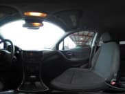 ✅ 2021 Chevrolet Trax LS • VIN: KL7CJNSB8MB321121 • Lot: 43556202. Listed on IAAI with 36,878 mi. Free auction sales archive from the USA and detailed vehicle history report at DreamBid. Image 18.