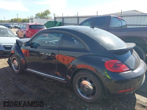 ✅ 2015 Volkswagen Beetle 1.8T • VIN: 3VWF17AT5FM653130 • Lot: 43598979. Listed on IAAI with 121,569 mi. Free auction sales archive from the USA and detailed vehicle history report at DreamBid. Image 3.