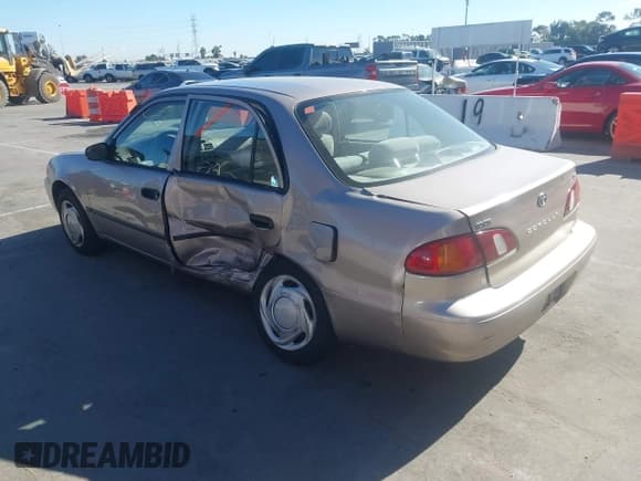 ✅ 1999 Toyota Corolla LE • VIN: 1NXBR12EXXZ231130 • Лот: 43595421. Опубликован ранее на IAAI с пробегом 126 441 миль. Бесплатный доступ к архиву аукционных продаж из США и подробный отчёт об истории автомобиля на DreamBid. Изображение 3.