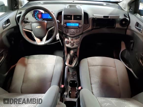 2012 Chevrolet Sonic LS with VIN 1G1JA5SHXC4152634, listed as a Copart auction lot 70631965 with 143,934 mi miles and Salvage title. Bid and sale history available at DreamBid. Image 8.