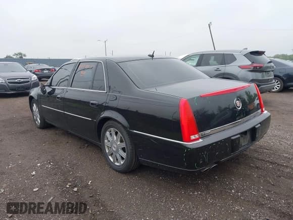 ✅ 2008 Cadillac DTS 1SC • VIN: 1G6KD57Y98U112597 • Lot: 42316077. Listed on IAAI with 181,662 mi. Free auction sales archive from the USA and detailed vehicle history report at DreamBid. Image 3.