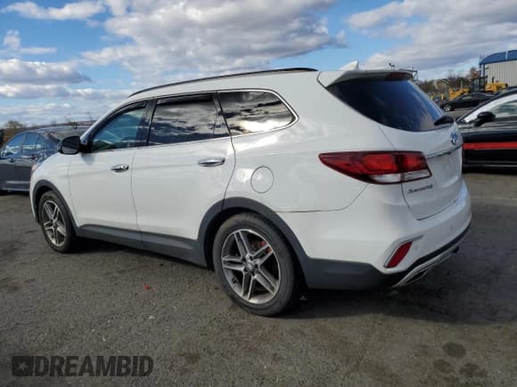 ✅ 2017 Hyundai Santa Fe SE Ultimate • VIN: KM8SRDHF2HU180726 • Lot: 91892915. Listed on Copart with 77,925 mi. Free auction sales archive from the USA and detailed vehicle history report at DreamBid. Image 2.