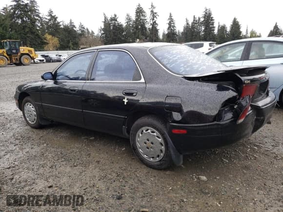 ✅ 1994 Mazda 626 DX • VIN: 1YVGE22C4R5198160 • Lot: 81629914. Wystawiony na Copart z przebiegiem 186 274 mil. Bezpłatny archiwum sprzedaży aukcyjnych z USA i szczegółowy raport historii pojazdu na DreamBid. Zdjęcie 2.