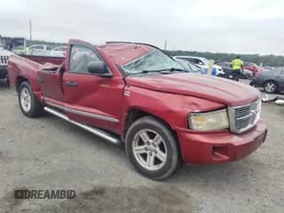 2010 Dodge Dakota Laramie z VIN 1D7CW5GP3AS156914, wystawiony jako IAAI lot #42569804 z przebiegiem 198 463 mil mil oraz . Historia ofert i sprzedaży dostępna na DreamBid. Obrazek 1.