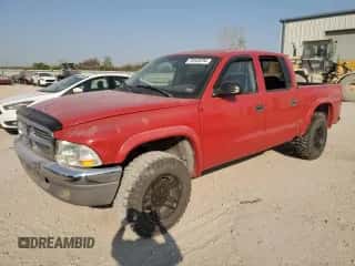2004 Dodge Dakota SLT z VIN 1D7HG48N04S627240, wystawiony jako Copart lot #75443294 z przebiegiem 151 334 mil mil oraz Szkoda całkowita • Salvage title. Historia ofert i sprzedaży dostępna na DreamBid. Obrazek 1.