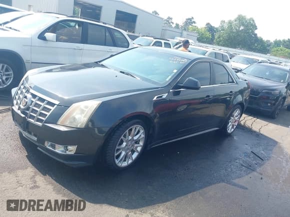 ✅ 2012 Cadillac CTS Premium • VIN: 1G6DS5E33C0108521 • Lot: 42599993. Listed on IAAI with 210,826 mi. Free auction sales archive from the USA and detailed vehicle history report at DreamBid. Image 2.