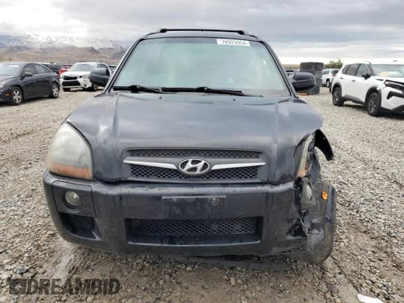 2009 Hyundai Tucson SE z VIN KM8JN72D49U975875, wystawiony jako Copart lot #76923954 z przebiegiem 167 155 mil mil oraz Szkoda całkowita • Salvage title. Historia ofert i sprzedaży dostępna na DreamBid. Obrazek 5.