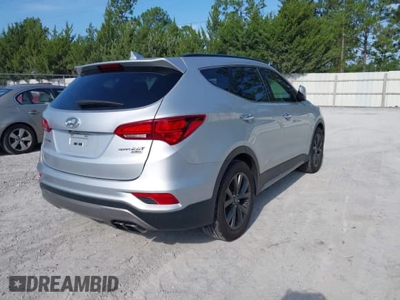 ✅ 2017 Hyundai Santa Fe Ultimate • VIN: 5XYZW4LA7HG407577 • Lot: 42429017. Listed on IAAI with 149,674 mi. Free auction sales archive from the USA and detailed vehicle history report at DreamBid. Image 4.