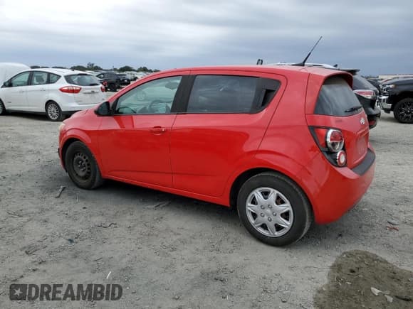 ✅ 2014 Chevrolet Sonic LS • VIN: 1G1JA6SG5E4125521 • Lot: 84605765. Listed on Copart with 89,219 mi. Free auction sales archive from the USA and detailed vehicle history report at DreamBid. Image 2.