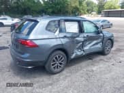 ✅ 2021 Volkswagen Tiguan S • VIN: 3VV1B7AX5MM148491 • Lot: 42561437. Listed on IAAI with 54,084 mi. Free auction sales archive from the USA and detailed vehicle history report at DreamBid. Image 4.