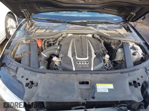 ✅ 2015 Audi A8 4.0T • VIN: WAU32AFD6FN022648 • Лот: 42358142. Опубликован ранее на IAAI с пробегом 103 416 миль. Бесплатный доступ к архиву аукционных продаж из США и подробный отчёт об истории автомобиля на DreamBid. Изображение 10.