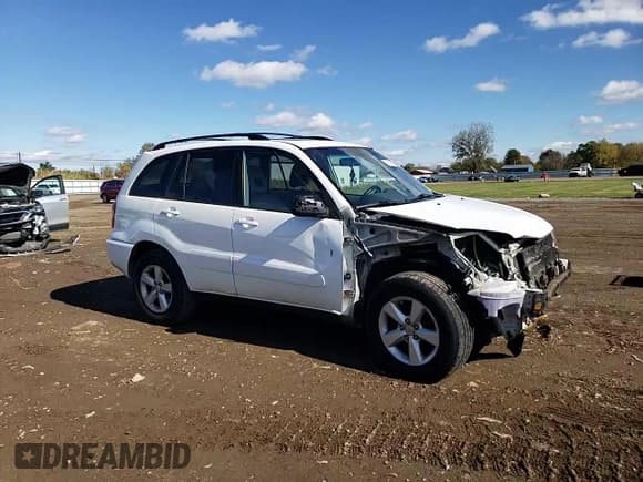 ✅ 2004 Toyota RAV4 • VIN: JTEHD20V640034315 • Lot: 82670355. Listed on Copart with 233,795 mi. Free auction sales archive from the USA and detailed vehicle history report at DreamBid. Image 15.