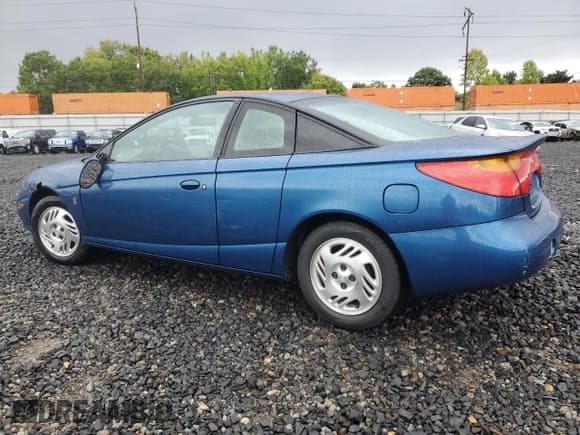 ✅ 2001 Saturn SC • VIN: 1G8ZR12791Z118164 • Лот: 74393904. Опубликован ранее на Copart с пробегом 158 308 миль. Бесплатный доступ к архиву аукционных продаж из США и подробный отчёт об истории автомобиля на DreamBid. Изображение 2.