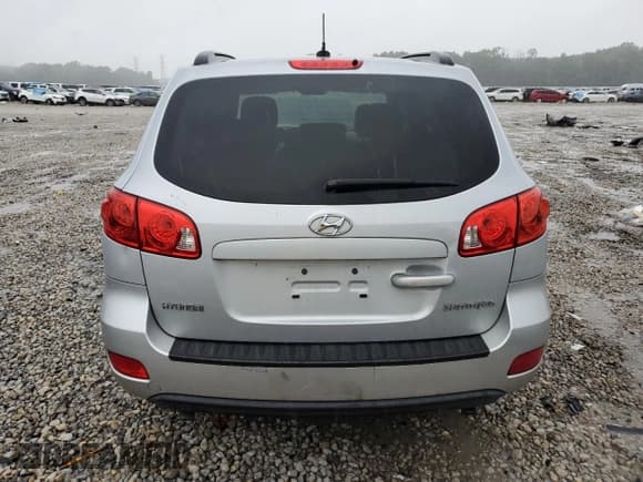 ✅ 2009 Hyundai Santa Fe GLS • VIN: 5NMSG13D19H323592 • Lot: 71422564. Listed on Copart with 193,786 mi. Free auction sales archive from the USA and detailed vehicle history report at DreamBid. Image 6.