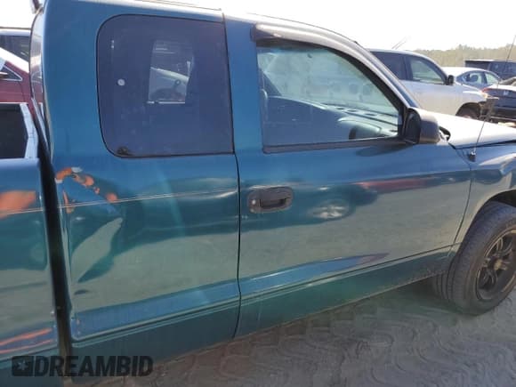 ✅ 1998 Dodge Dakota SLT • VIN: 1B7GL22XXWS571049 • Lot: 75878644. Wystawiony na Copart z przebiegiem Nie podano. Bezpłatny archiwum sprzedaży aukcyjnych z USA i szczegółowy raport historii pojazdu na DreamBid. Zdjęcie 10.