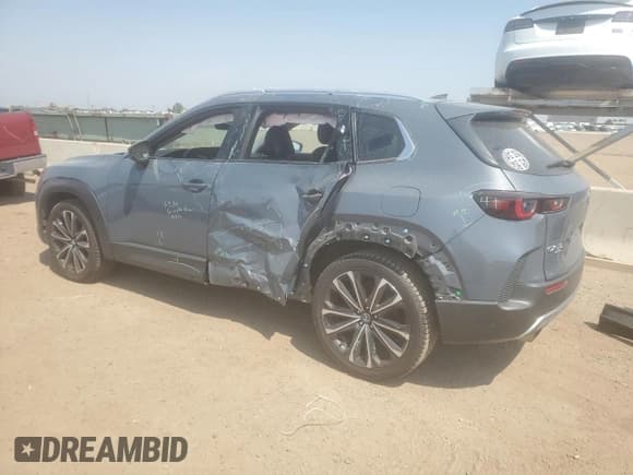 ✅ 2023 Mazda CX-50 Premium Plus • VIN: 7MMVABEY7PN100610 • Lot: 67319075. Wystawiony na Copart z przebiegiem 43 376 mil. Bezpłatny archiwum sprzedaży aukcyjnych z USA i szczegółowy raport historii pojazdu na DreamBid. Zdjęcie 2.