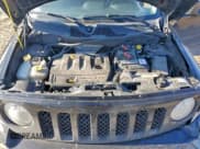 ✅ 2015 Jeep Patriot Altitude • VIN: 1C4NJRBB8FD169965 • Лот: 96616955. Опубликован ранее на Copart с пробегом 159 061 миль. Бесплатный доступ к архиву аукционных продаж из США и подробный отчёт об истории автомобиля на DreamBid. Изображение 11.