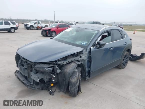 ✅ 2023 Mazda CX-30 S Carbon Edition • VIN: 3MVDMBCM0PM532449 • Lot: 41799255. Listed on IAAI with 60,604 mi. Free auction sales archive from the USA and detailed vehicle history report at DreamBid. Image 19.