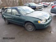 ✅ 2000 Toyota Corolla VE • VIN: 2T1BR18EXYC334347 • Lot: 43777101. Listed on IAAI with 171,626 mi. Free auction sales archive from the USA and detailed vehicle history report at DreamBid. Image 1.